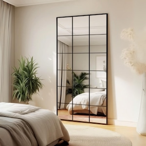 The modern wavy garden mirror adds an elegant touch to your home decoration with its minimalist and stylish design. The luxurious and modern windowpane mirror is also perfect for hotels, cafes and offices.