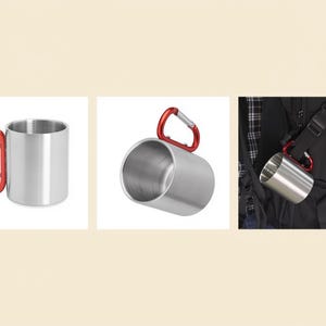 May include: A set of three stainless steel camping mugs with red carabiner handles. One mug is upright, another is tilted, and the third is attached to a black backpack. The mugs are designed for outdoor use and are durable and portable.