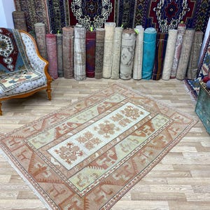 Faded Oushak Rug 5x7: Vintage Turkish Wool Area Rug