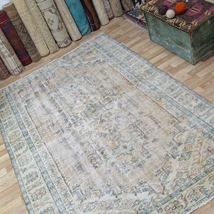 6x9 Vintage Turkish Oushak Rug: Faded Black, Green, and Beige