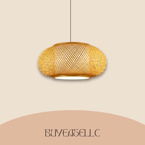 May include: A hanging pendant light with a woven, natural bamboo shade. The light fixture has a rounded, oval shape and a warm, golden color. The text "BUYENSELLC" is at the bottom of the image.