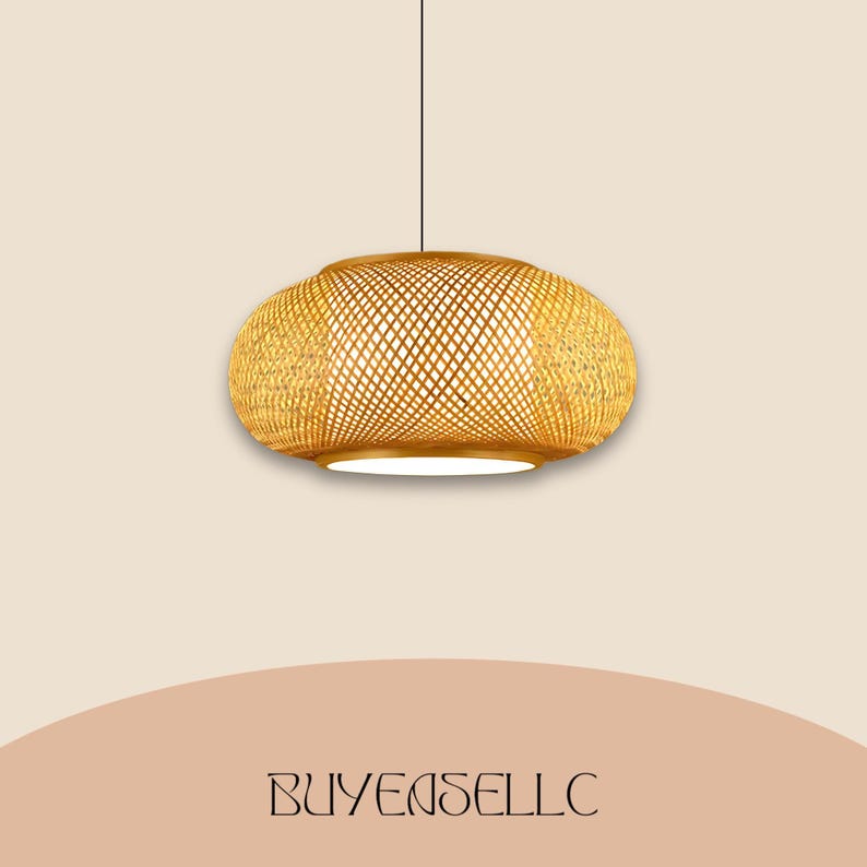 May include: A hanging pendant light with a woven, natural bamboo shade. The light fixture has a rounded, oval shape and a warm, golden color. The text "BUYENSELLC" is at the bottom of the image.