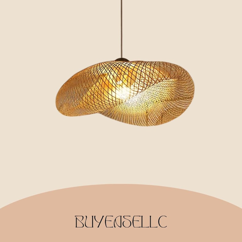 May include: A woven rattan pendant light fixture. The light has a unique, organic shape and is suspended from a dark cord. The light is a warm, golden color, and the woven pattern creates interesting shadows. The light fixture is a stylish home decor item.