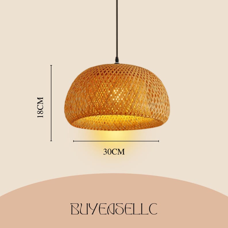 May include: A woven bamboo pendant light. The light fitting is a warm, natural colour, with a diameter of 30 cm and a height of 18 cm. It hangs from a black cord. The light is a dome shape.