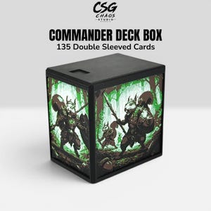 May include: A black rectangular deck box labeled CSG CHAOS STUDIO COMMANDER DECK BOX 135 Double Sleeved Cards. The front panel features a green and brown illustration of two squirrels dressed as warriors holding spears in a forest setting.