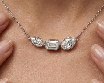 Drei-Stein-Lünette Halskette | Marquise, Smaragd, ovale Diamantschnitte