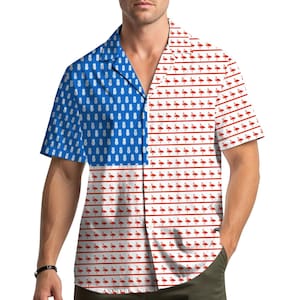 May include: Short-sleeved button-down shirt with a unique design. One side features a blue background with white pineapple shapes, while the other side has a white background with red flamingo patterns. The shirt is a vibrant and eye-catching piece.