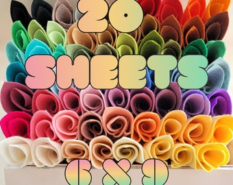May include: A collection of 20 sheets of felt fabric rolled into individual tubes, featuring a wide spectrum of colors including black, white, red, orange, yellow, green, blue, and purple. The text 20 SHEETS 6 X 9 is overlaid on the image.