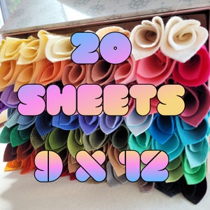 May include: A stack of 20 colourful felt sheets, each measuring 9 x 12 inches. The sheets are rolled up and arranged in a rainbow pattern.