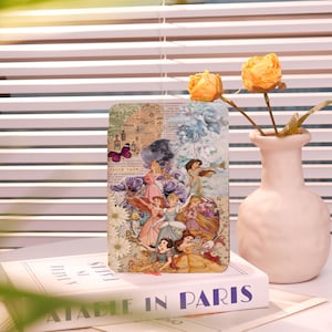 May include: A collage of Disney princesses in vintage style with a butterfly and the text "Fairy tale..." on a white background.