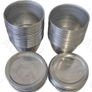 Återanvändbara moimoi-tallrikar i aluminium med lock x 12 st