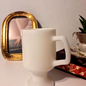 Hazel Atlas textured milk glass pedestal Mug