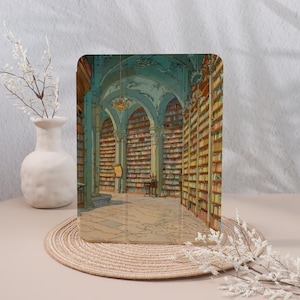 May include: A rectangular decorative panel featuring an illustration of a grand library interior. The artwork depicts rows of bookshelves, arched ceilings, and a central reading area, rendered in muted tones.