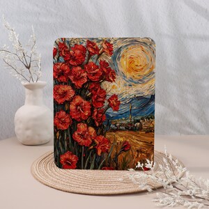 May include: Rectangular art print featuring a vibrant floral arrangement of red flowers in the foreground, set against a swirling, impressionistic landscape with a bright yellow sun and a field. The artwork is displayed on a beige surface.