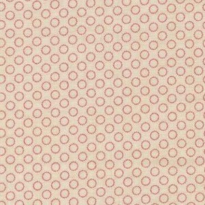 May include: A cream-colored fabric with a repeating pattern of small, red circles. The circles are evenly spaced across the surface, creating a textured appearance. The fabric is likely cotton or a similar material, suitable for quilting or crafting.