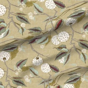 May include: Fabric with a botanical pattern featuring white, spherical flower clusters, green and burgundy leaves, and gray branches on a tan background. The design has a vintage, hand-drawn aesthetic, suitable for various craft projects.