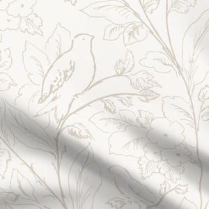 May include: Off-white fabric with a repeating pattern of sketched birds, flowers, and foliage in a muted beige color. The design features detailed outlines of leaves, blossoms, and birds perched on branches, creating a delicate, nature-inspired aesthetic.