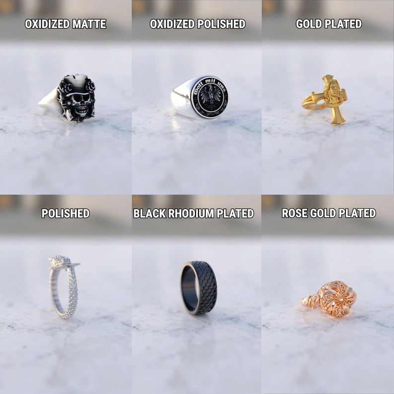 May include: A collection of rings in various styles and finishes. The rings include an oxidized matte skull ring, a polished ring with a crest, a gold-plated ring with a cross, a polished ring with a textured band, a black rhodium plated ring, and a rose gold plated ring.
