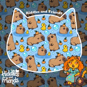 May include: A pattern featuring brown capybaras with oranges on their heads, yellow rubber ducks, and blue bubbles on a light blue background, framed by a white cat-shaped outline with the text Hiddles and Friends at the top and bottom.