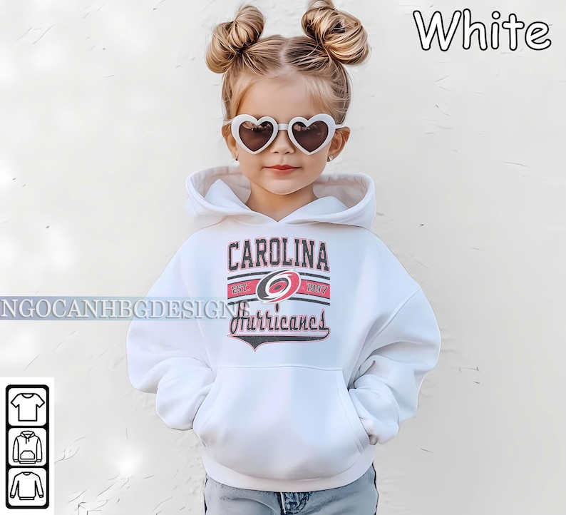 May include: White hooded sweatshirt with a Carolina Hurricanes logo and the text "Carolina" and "Hurricanes".