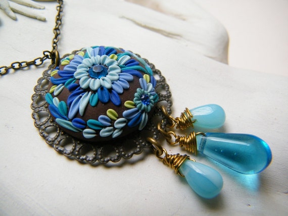 Items similar to Blue Bells. Polymer Clay Pendant on Etsy