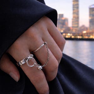 May include: A rustic wooden sign with the text "Welcome to our home" in white lettering. The sign features a distressed finish and a simple, inviting design, perfect for entryway decor.