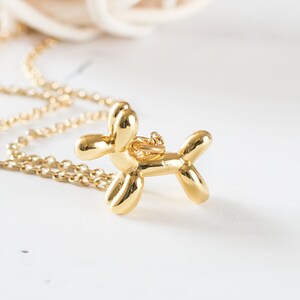 Gold balloon dog necklace Clearance