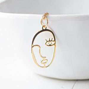 Gold Plated Abstract Face Necklace. Woman Face Pendant Necklace. Modern Line Art Necklace. Gift for an Artist or a Painter.