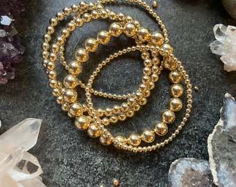 Luxe Gold beaded bracelets set - Bundled set of 5 seamless 14k gold filled rounds