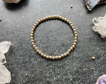 4 mm 14k gold filled bracelet - 4 mm gold rounds - gold stretch bracelet - gold  beaded stacker bracelet