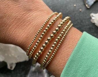 Dainty Luxe Gold beaded bracelets set - Bundled set of 5 seamless 14k gold filled rounds