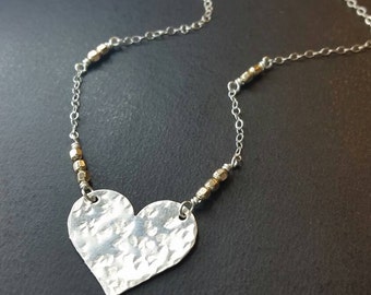 Silver hammered heart festoon with gold beaded chain