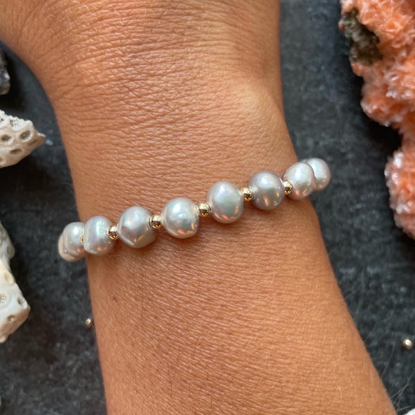 Potato Pearl stretch bracelet with 14k gold filled spacers - 7-8 mm luxe grey potato pearls, bracelet is shown stacked with others