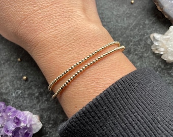 Dainty beaded stretch bracelet- 2 mm seamless rounds - available in sterling silver or 14k gold filled