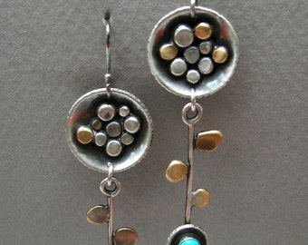 Dangling flower earrings: Long sterling silver and brass abstract flower earrings with leaves and 4 mm turquoise stone