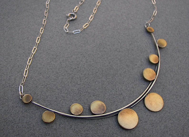 Architectural necklace: sterling-silver, modern, architectural necklace with cascading brass discs image 1