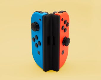 Ergonomischer Einhand-Joy-Con-Griff – Beidhändig tragbar – Synchro-Leuchtanzeige – Nintendo Switch-Zugriffshilfe – Kostenloser Versand