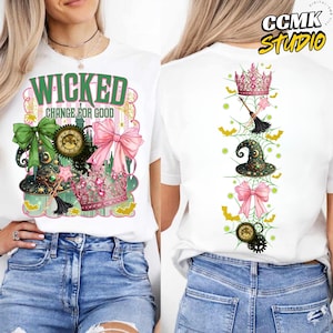May include: White t-shirt with a colourful graphic design featuring the word "WICKED" and the phrase "CHANGE FOR GOOD". The design includes a witch hat, bows, a crown, and a clock. The back of the shirt has a vertical design with a crown, broom, hat, bow, and clock.