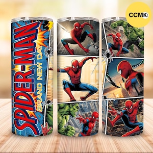 May include: A cylindrical tumbler featuring comic book panels of Spider-Man and the Hulk. The design includes the text Spider-Man Brand New Day in large red and blue letters, along with various illustrations of Spider-Man in action poses.