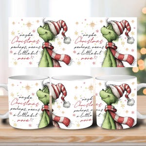 May include: White ceramic mugs featuring a green cartoon character with a red and white striped hat and scarf. The mugs have the text "maybe Christmas perhaps, means a little bit more!" and snowflake accents.