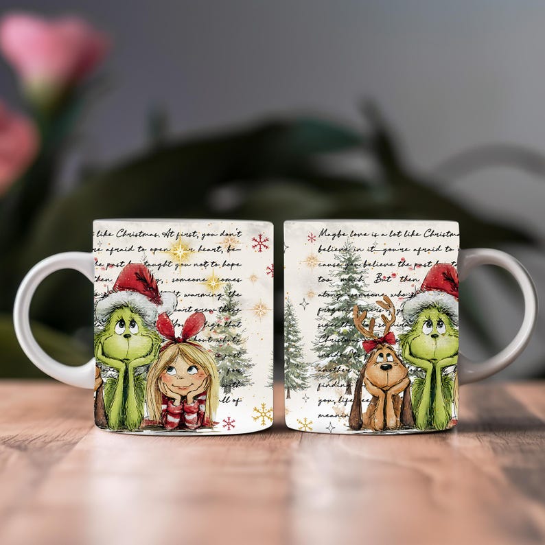 May include: White ceramic mug featuring Grinch and Cindy Lou Who characters in Santa hats, along with a reindeer dog and Christmas trees. The mug has a festive design with snowflakes and text, perfect for holiday gifting.
