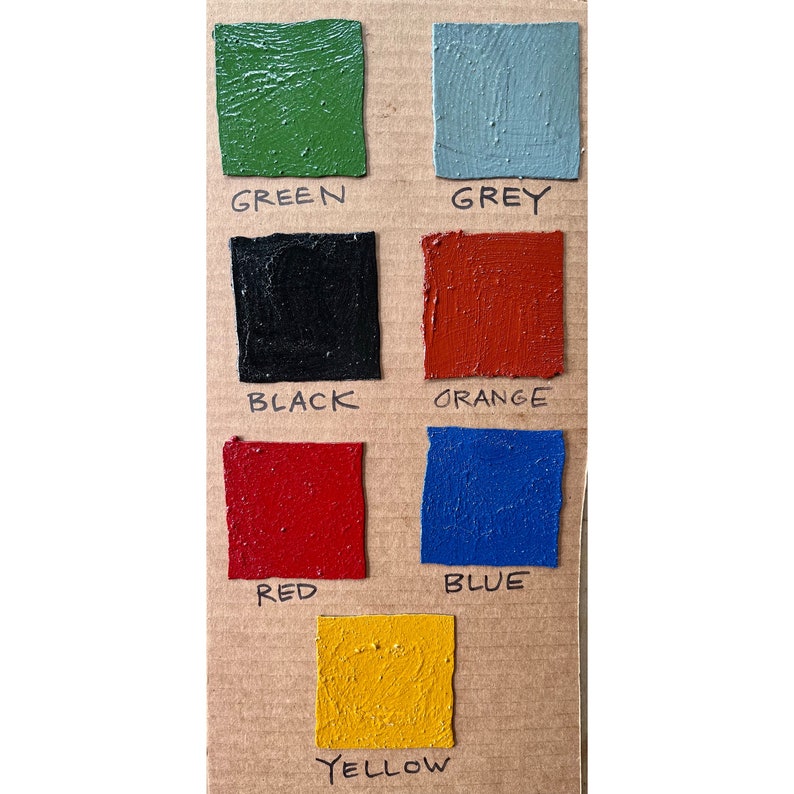 K&ouml;nnte beinhalten: Eine Farbkarte mit Farbmustern in Gr&uuml;n, Grau, Schwarz, Orange, Rot, Blau und Gelb.