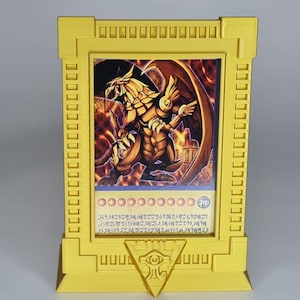 Golden Card Display Set – Ra Edition – Includes Framed Winged Dragon Card – Premium Stand + Card Combo – Collector’s Display Piece