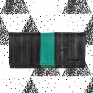 Recycled inner tube women's wallet with green insert. Sustainable clutch purse, vegan friendly, handmade in Italy.