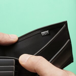 Slim Wallet for men, limited edition. Handmade from bike tubes. Holds coins, cards and notes. Functional and very durable.