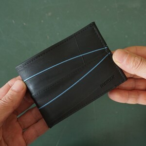 Slim Wallet for men, limited edition. Handmade from bike tubes. Holds coins, cards and notes. Functional and very durable.