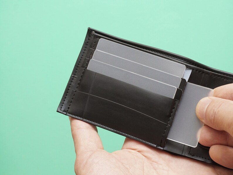 Slim Wallet for men, limited edition. Handmade from bike tubes. Holds coins, cards and notes. Functional and very durable.