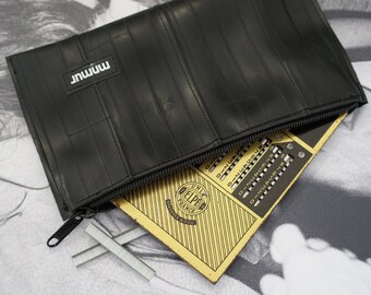 Large black  zipper pouch made from recycled bicycle inner tubes.