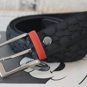 Black men's belt handmade in Italy from recycled bike tires.