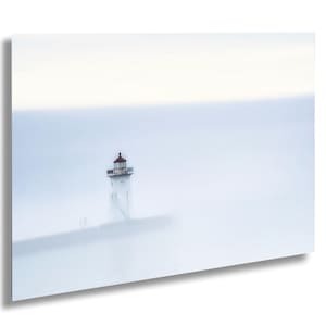 Lighthouse in the fog on Lake Superior in Grand Marais, Minnesota